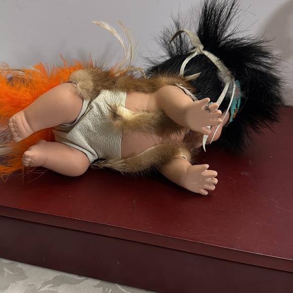 Highly Collectable Native American Crawling Baby Porcelain Doll with Feathers - Picture 6 of 8